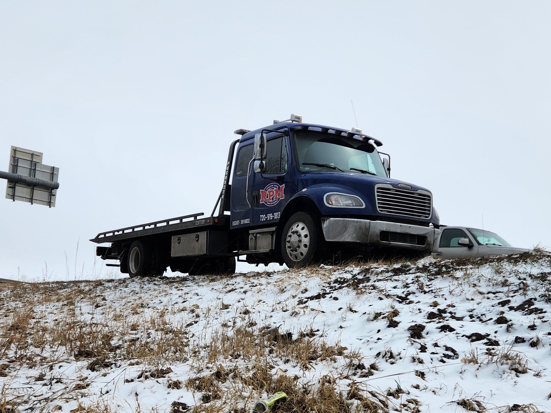 this image shows tow truck in Parker, CO