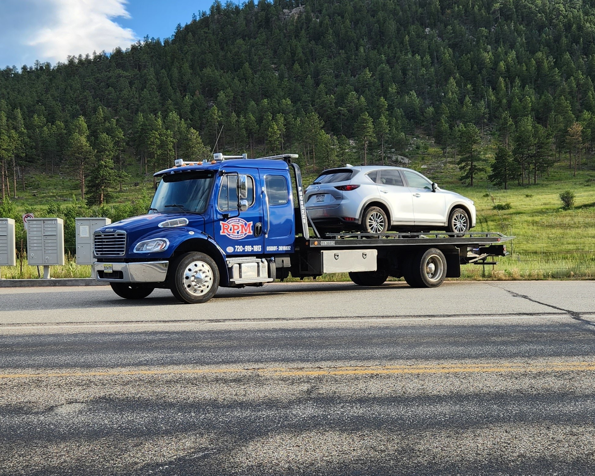 this image shows long-distance towing services in Parker, CO